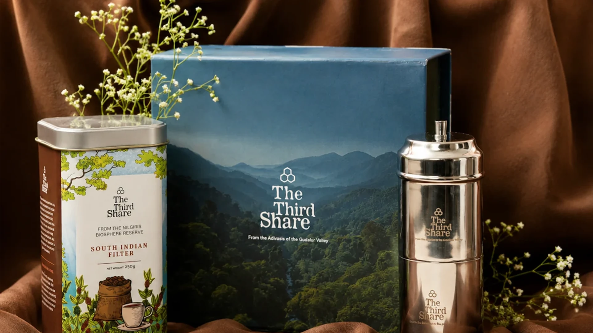 The Third Share gift box with South Indian filter coffee and a steel filter pot